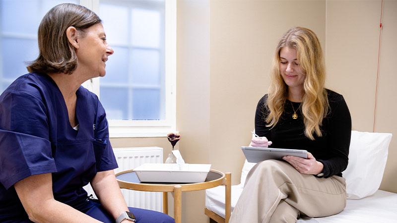 Female patient talking to a fertility doctor